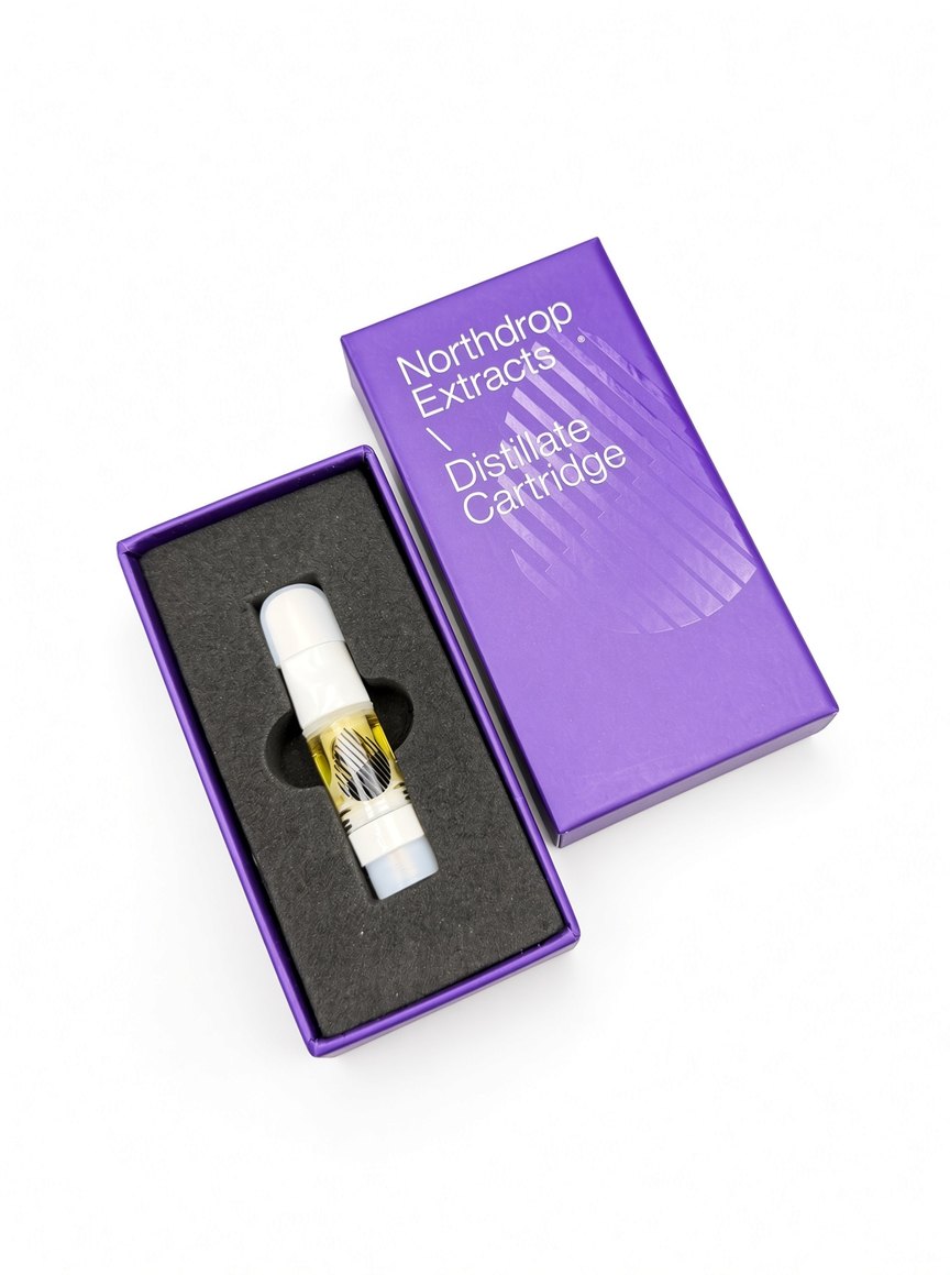Northdrop Extracts Distillate Cartridge resting in the foam insert of its opened box